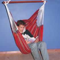 The hanging chair made of brightly striped, light cotton cloth